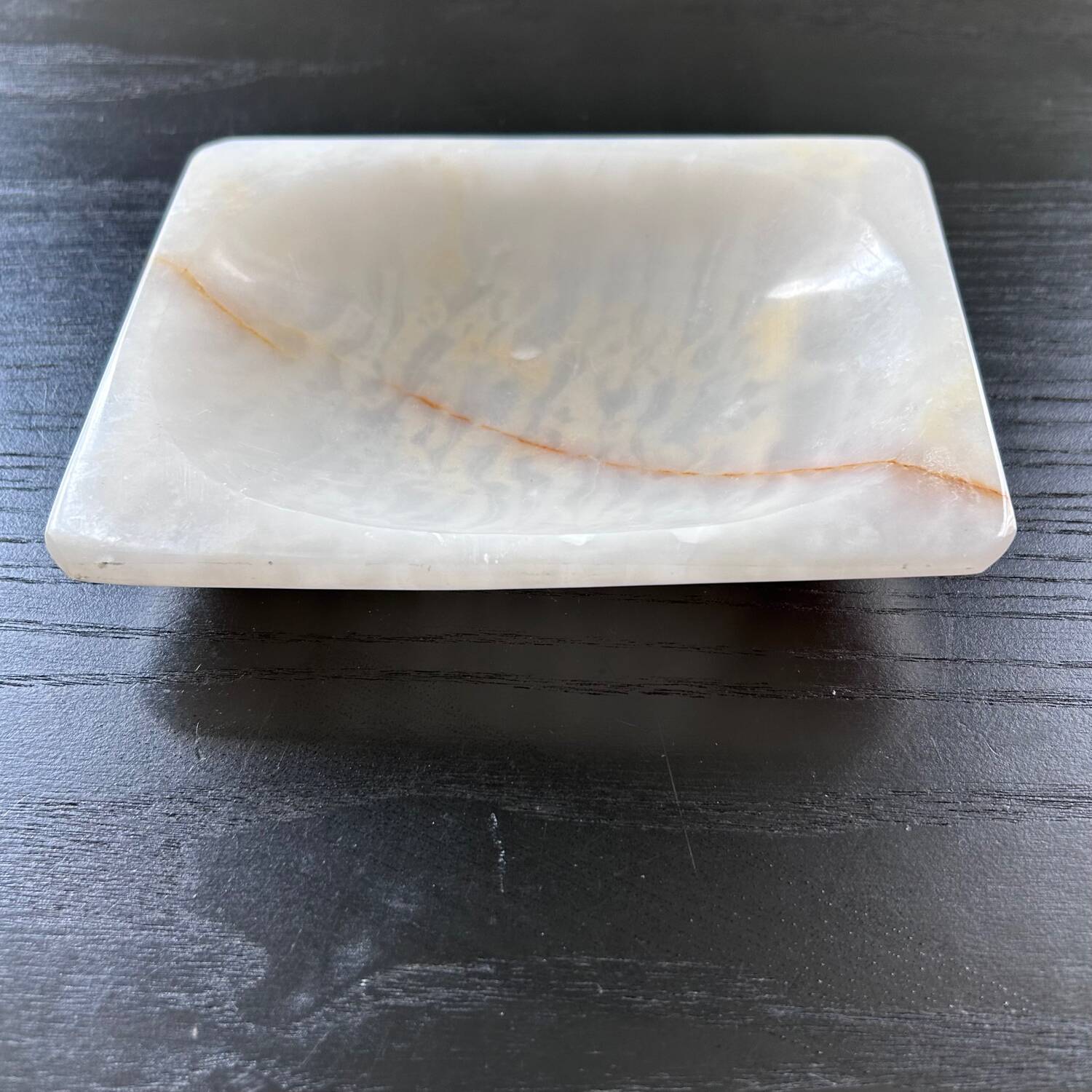 White onyx pocket emptier