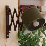 Scandinavian wall lamp in teak, 1960s, with accordion arm.