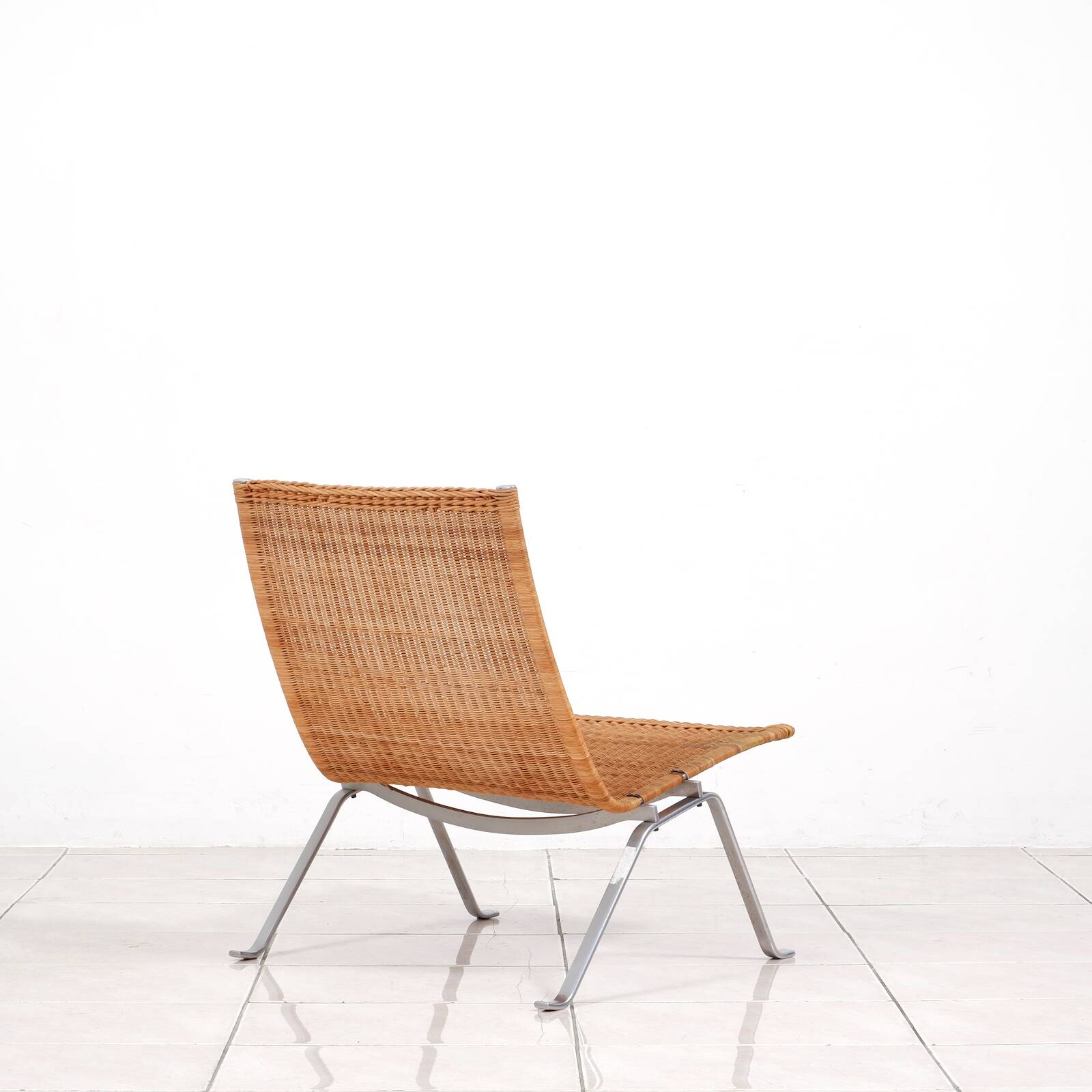 PK 22“ lounge chair in rattan by Poul Kjaerholm for E. Kold Christensen