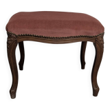 Louis XV stool — elegant curves and warm patina