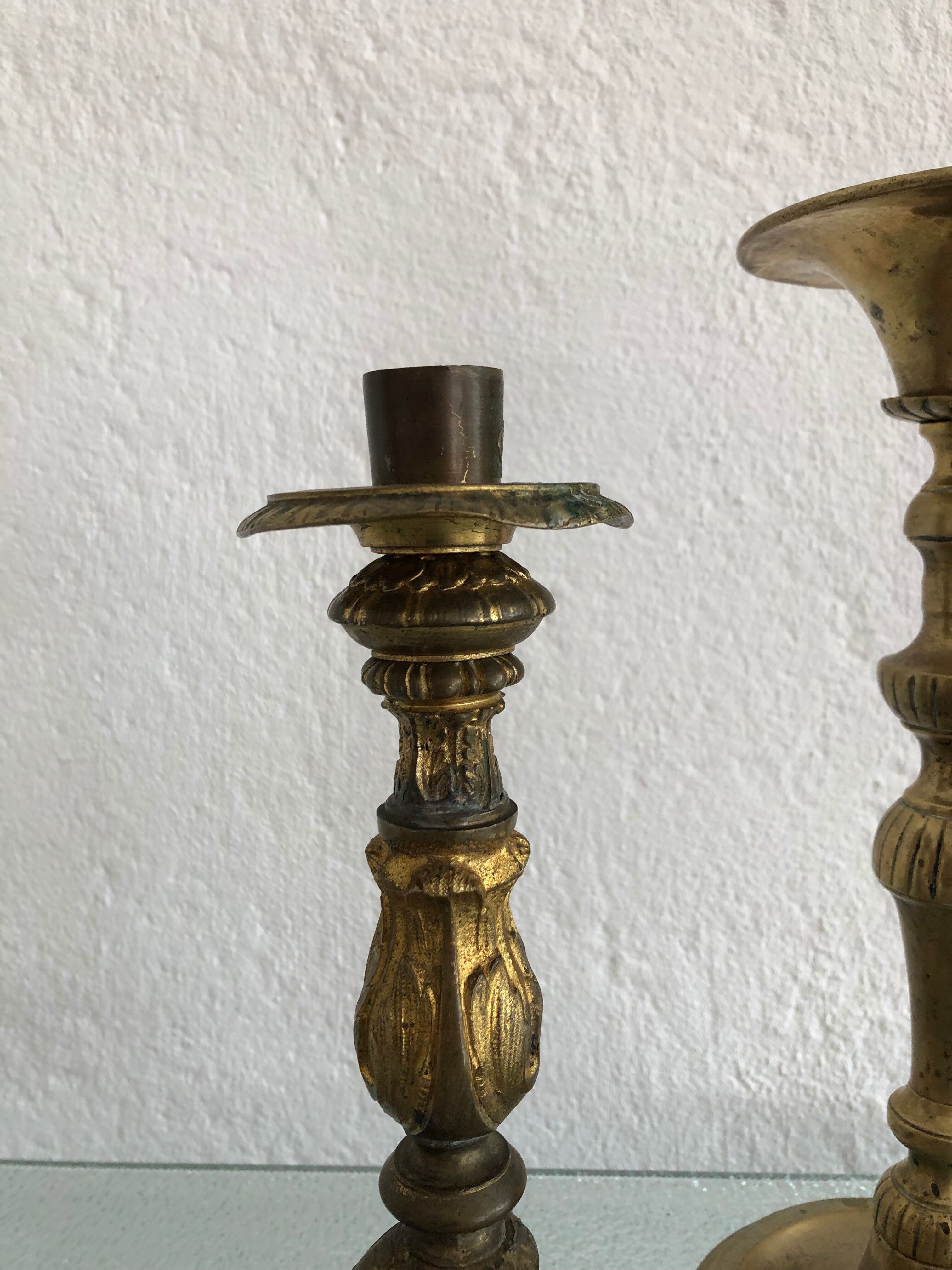 Duo de bougeoirs en bronze anciens
