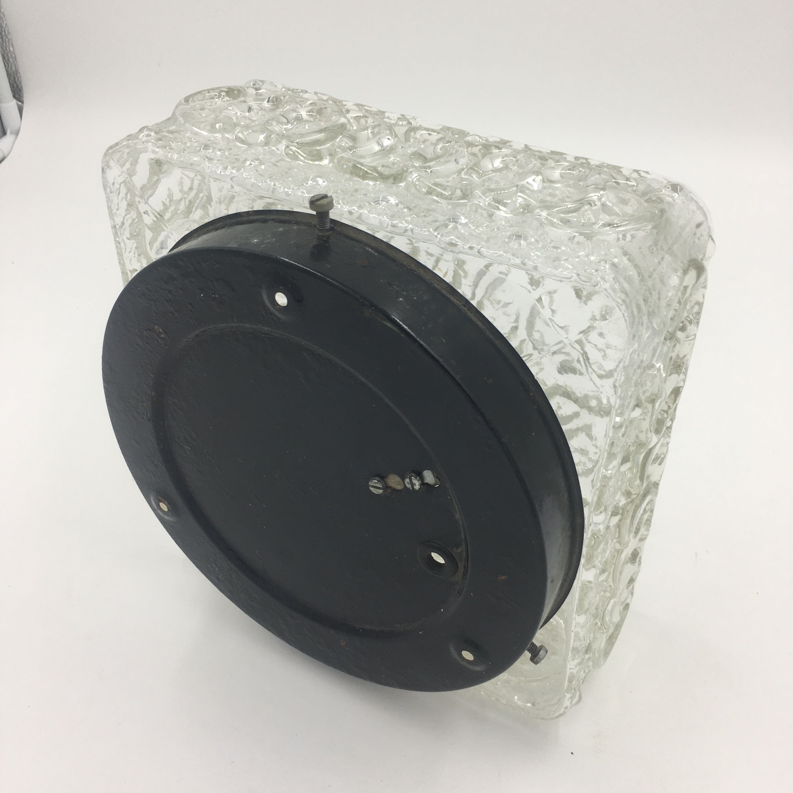 Ceiling lamp in molded glass in relief