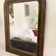 Louis-Philippe mirror, wood and gilded stucco — late 19th century