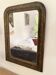 Louis-Philippe mirror, wood and gilded stucco — late 19th century