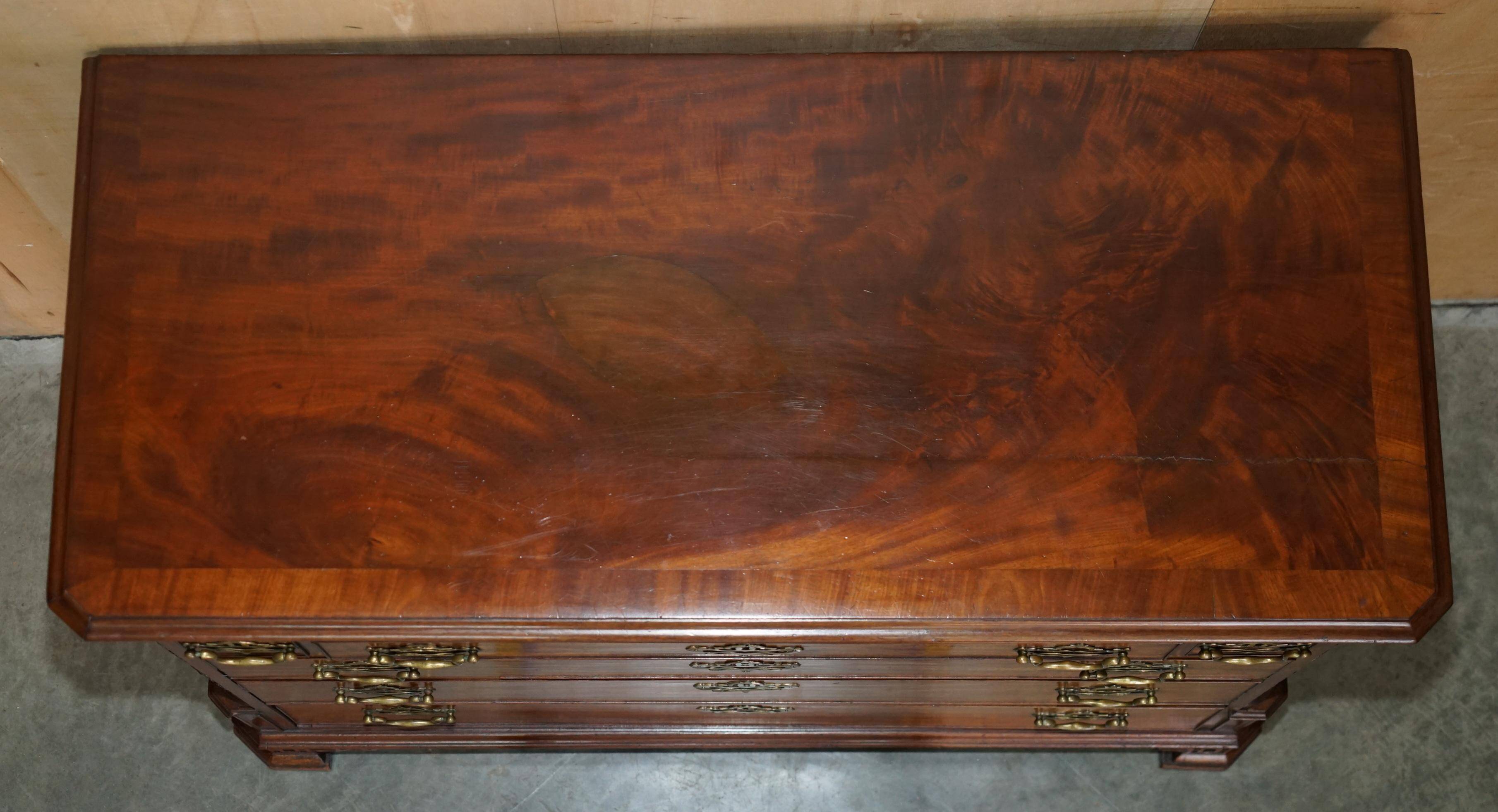 George III commode circa 1770 in walnut by Thomas Chippendale.