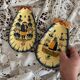 Shell-shaped butter dishes by Henriot Quimper for placing or hanging.