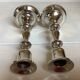 Pair of silver metal candlesticks