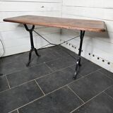 Table de bistrot pieds en fonte dessus en bois massif