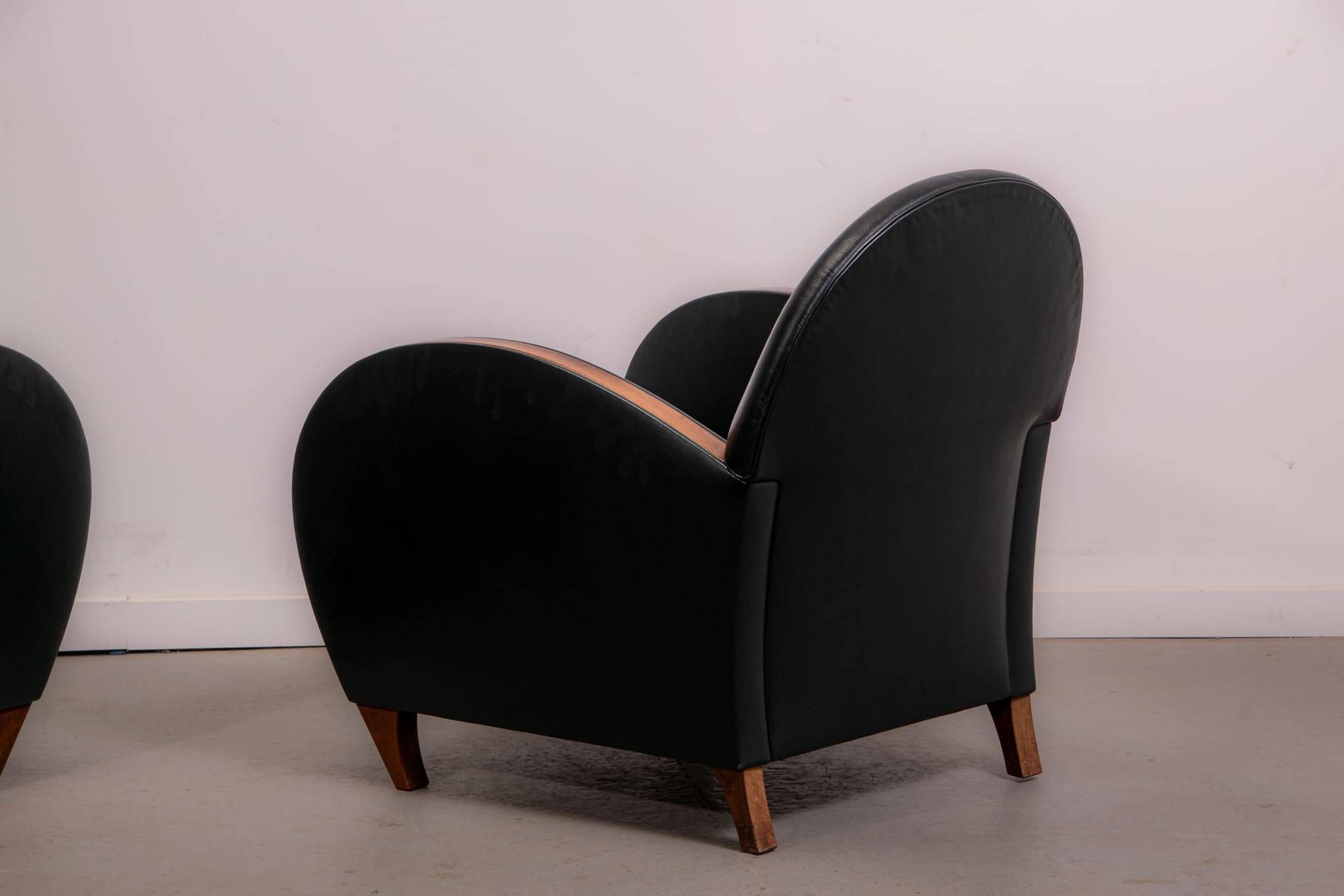 Pair of mid-century leather armchairs, circa 1970, made in Belgium.