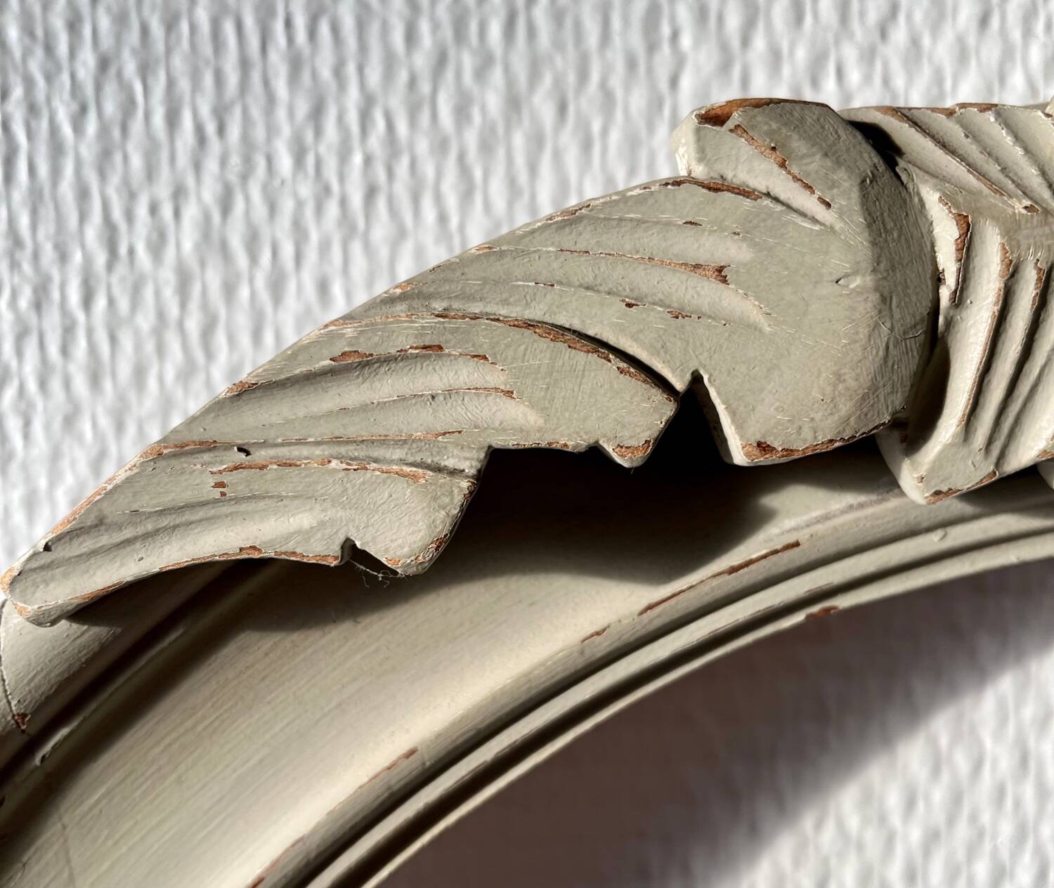 Oval frame in weathered wood