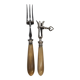 Set of silver-plated leg of lamb handles and fork, with horn handles.