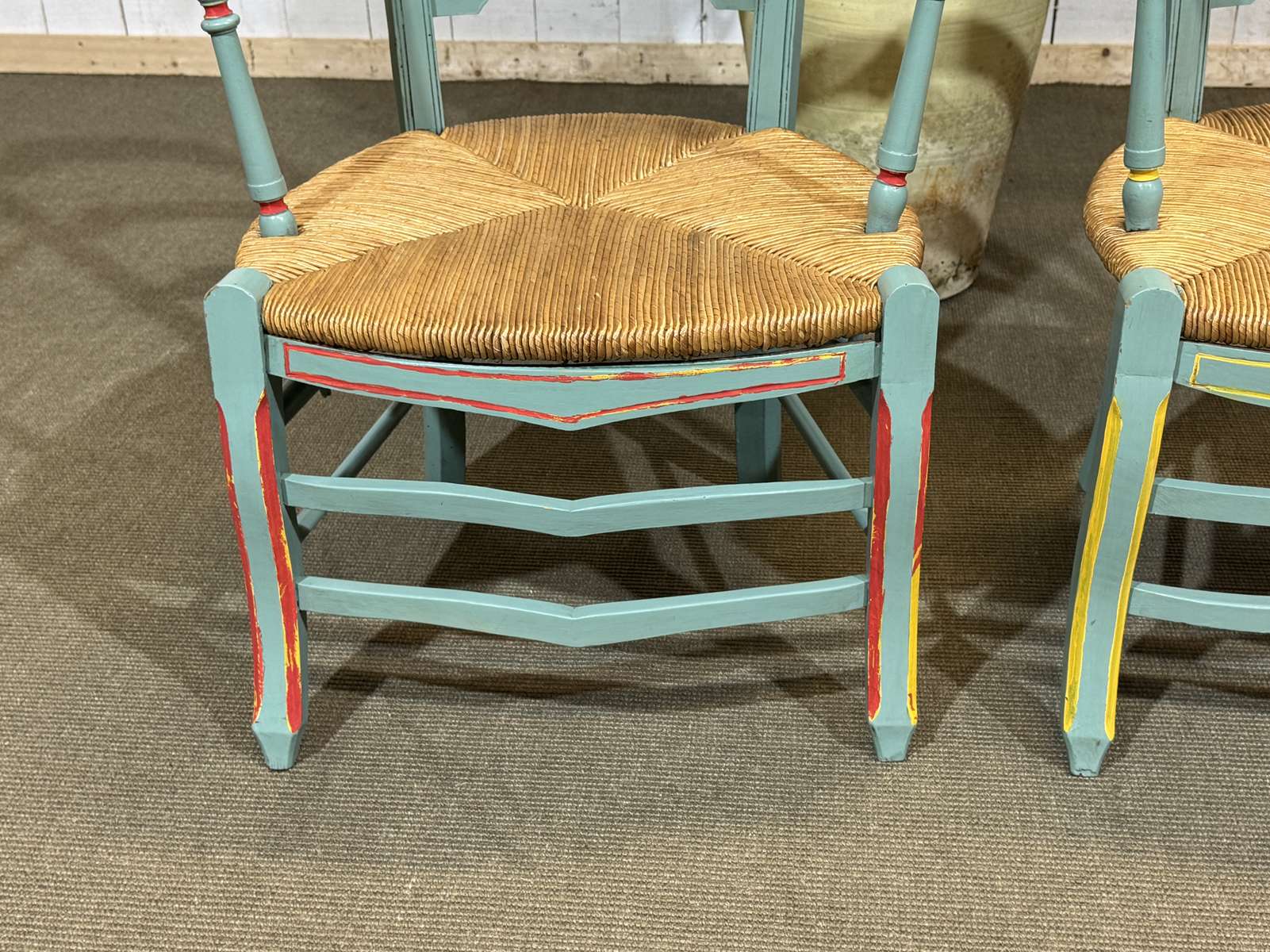 Pair of rustic armchairs in beech with straw seats.