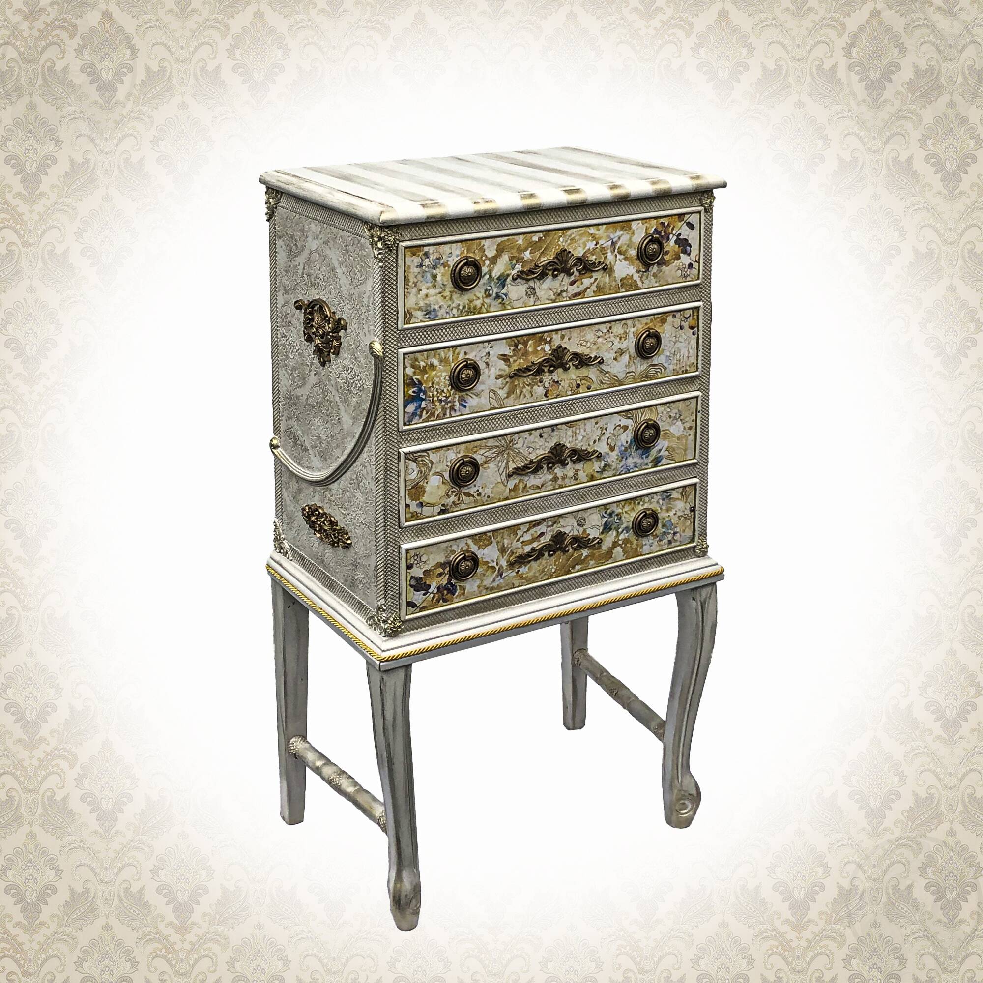 Vintage commode refurbished with 4 drawers in classic style with floral decor.