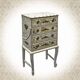 Vintage commode refurbished with 4 drawers in classic style with floral decor.