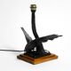 1940s table lamp made of iron in the shape of an eagle, teak wooden base