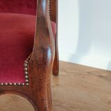 Red voltaire armchair