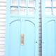 Double front door, fir and windows at the top