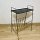 Perforated metal magazine rack