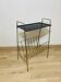 Perforated metal magazine rack