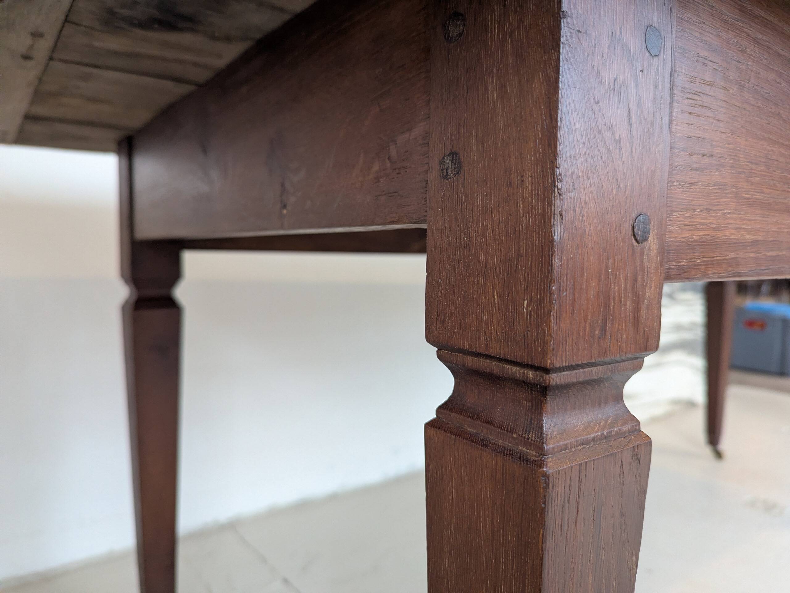 Campaign table in solid oak, Directoire style.