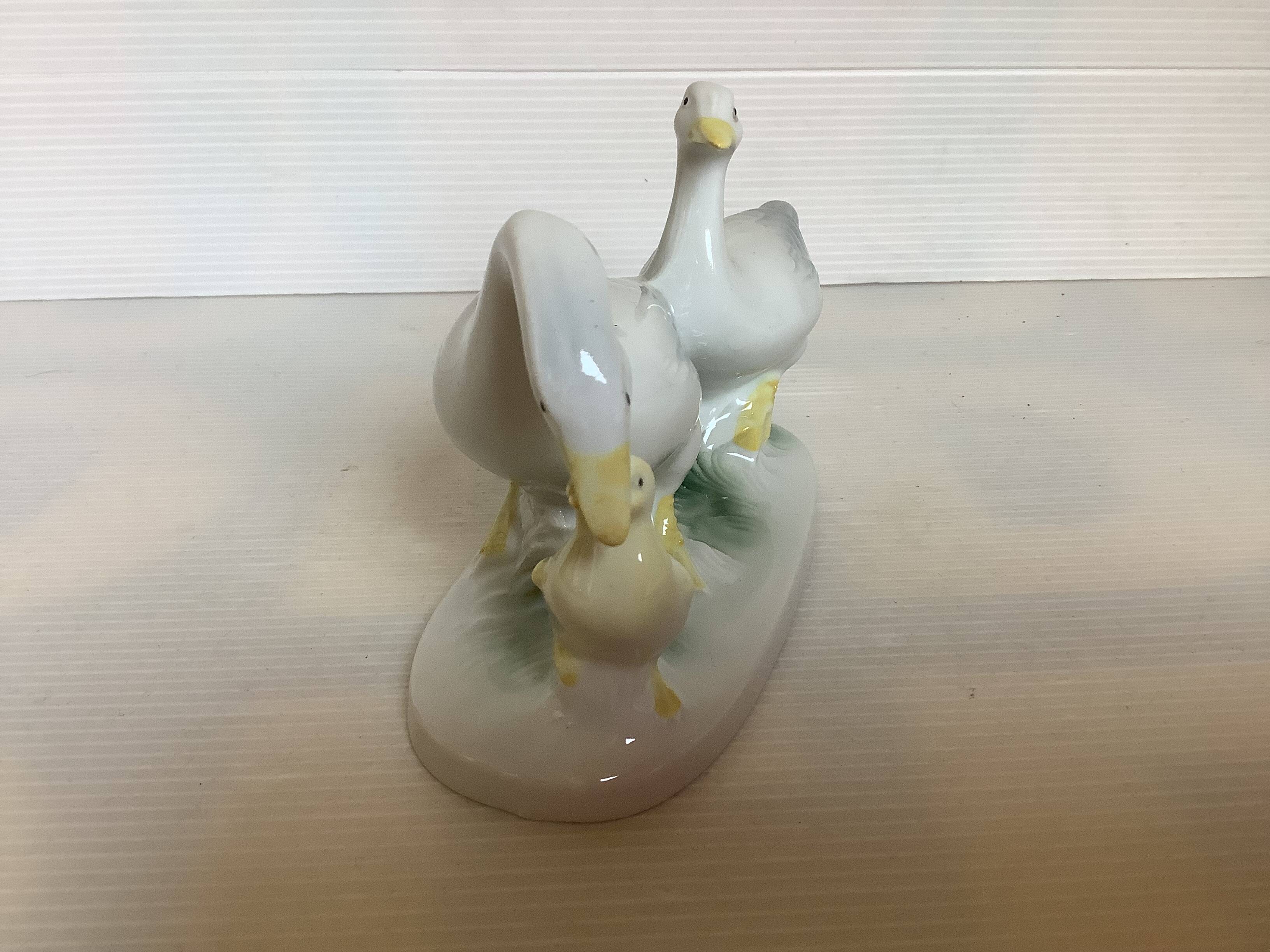 Trio of ceramic geese