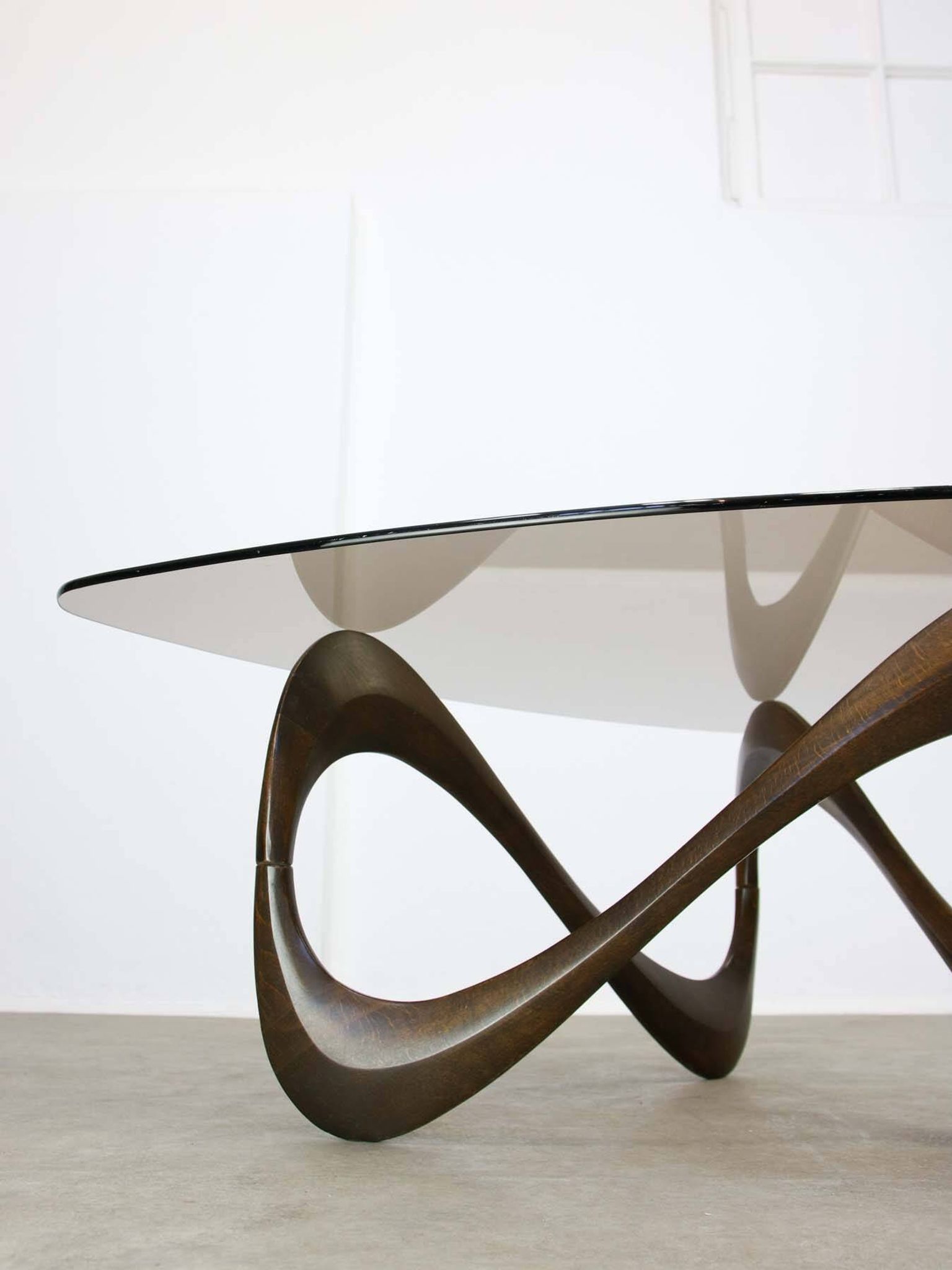 Italian Organic "Snake" Wooden and Smoked Glass Coffee Table, 1960s