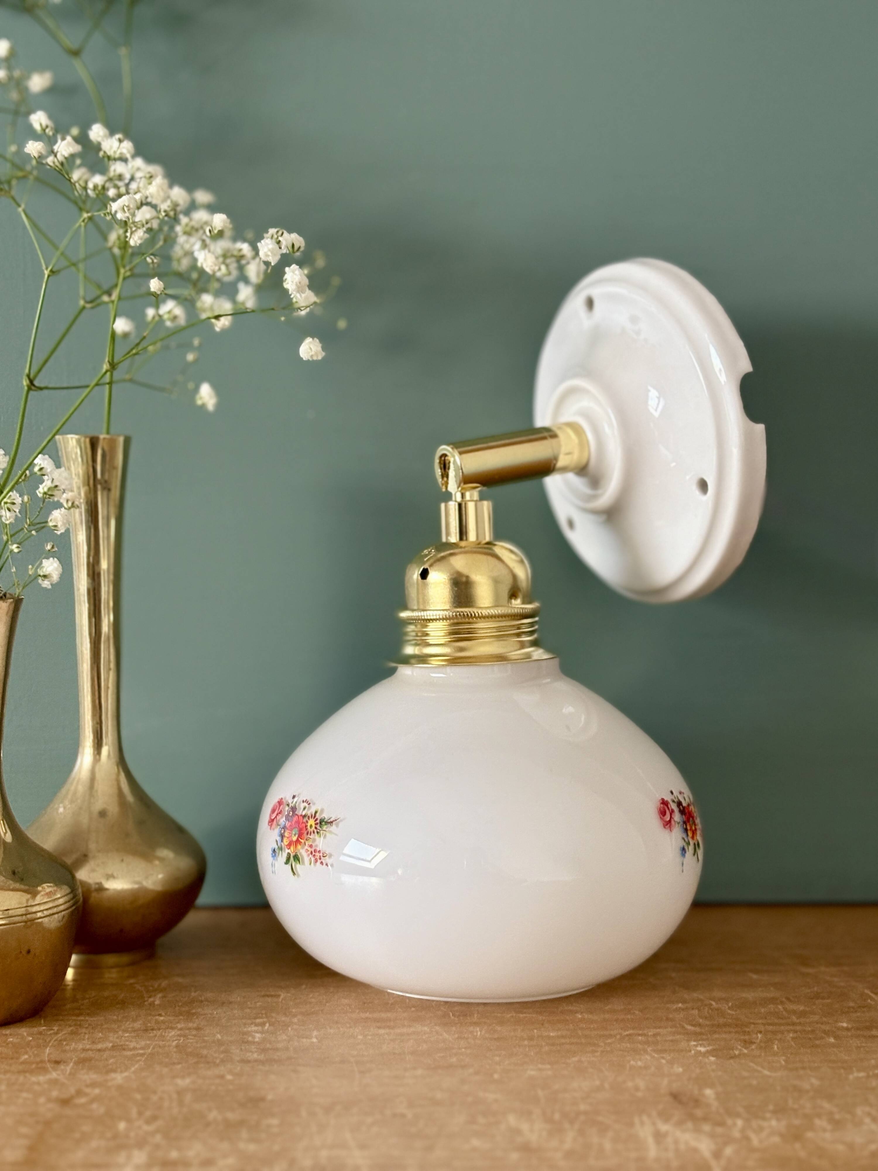 Vintage globe wall sconce in white opaline glass with floral decorations