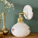 Vintage globe wall sconce in white opaline glass with floral decorations