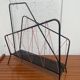 Vintage perforated metal magazine rack with cord handles by Matégot from the 1950s-60s.