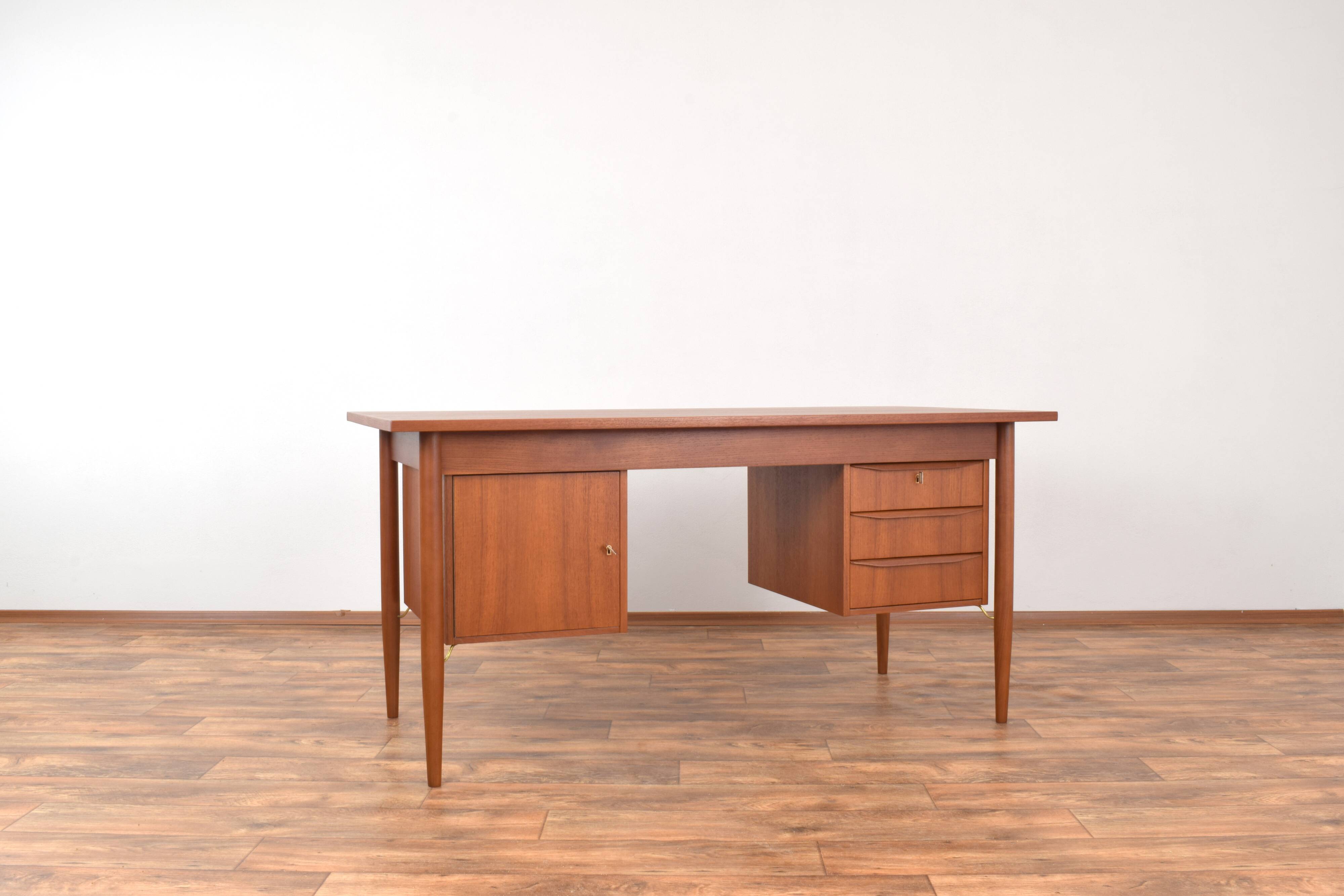 Mid-Century Danish Teak Desk by Gunnar Nielsen for Tibergaard, 1960s.