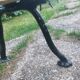 Antique garden bench with cast iron legs