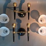 Pair of two-light torchiere wall lights in black lacquered metal and gilded brass, Circa 1960.