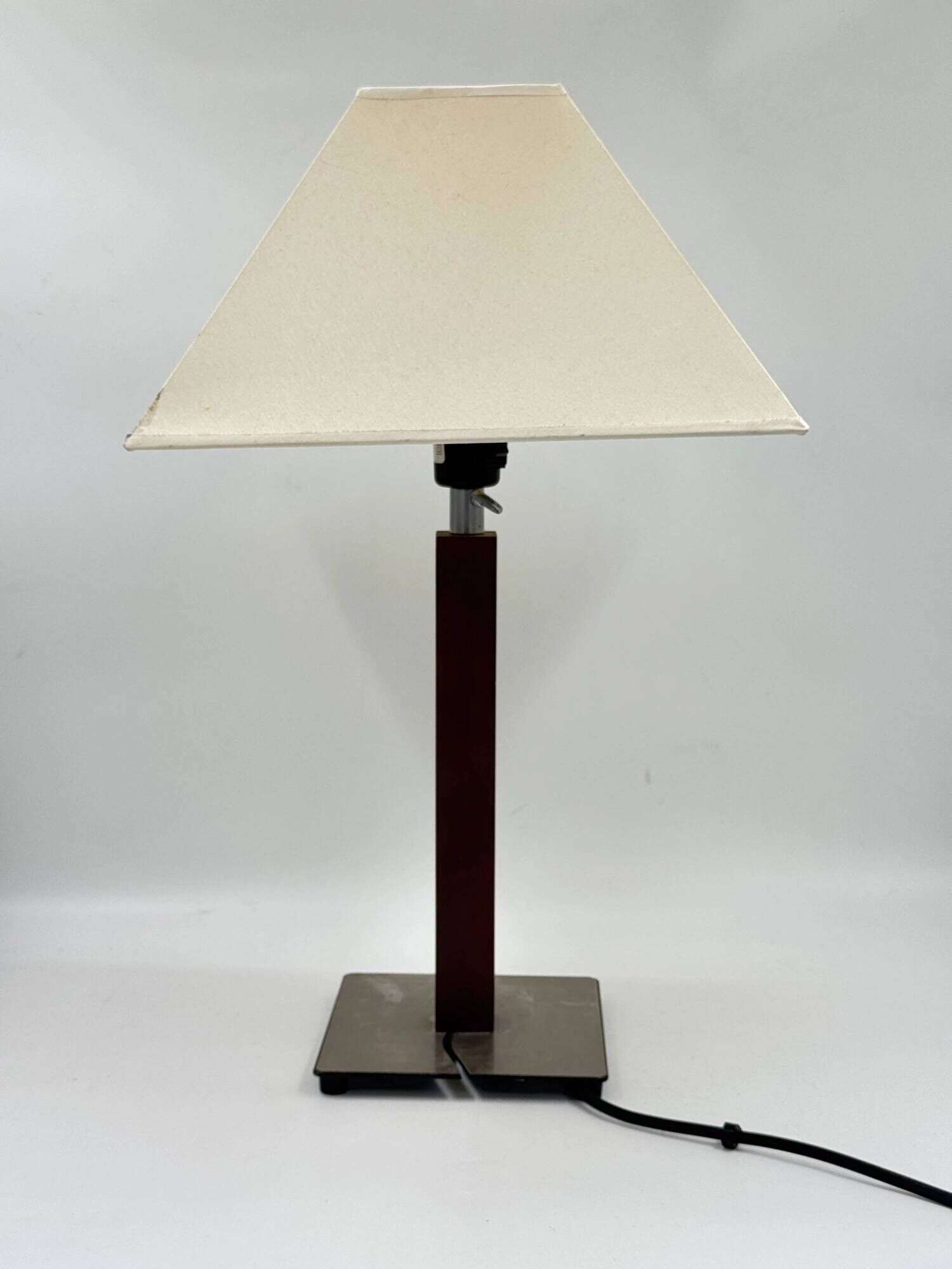 Vintage table lamp with a square wooden column and brushed steel base.
