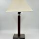 Vintage table lamp with a square wooden column and brushed steel base.