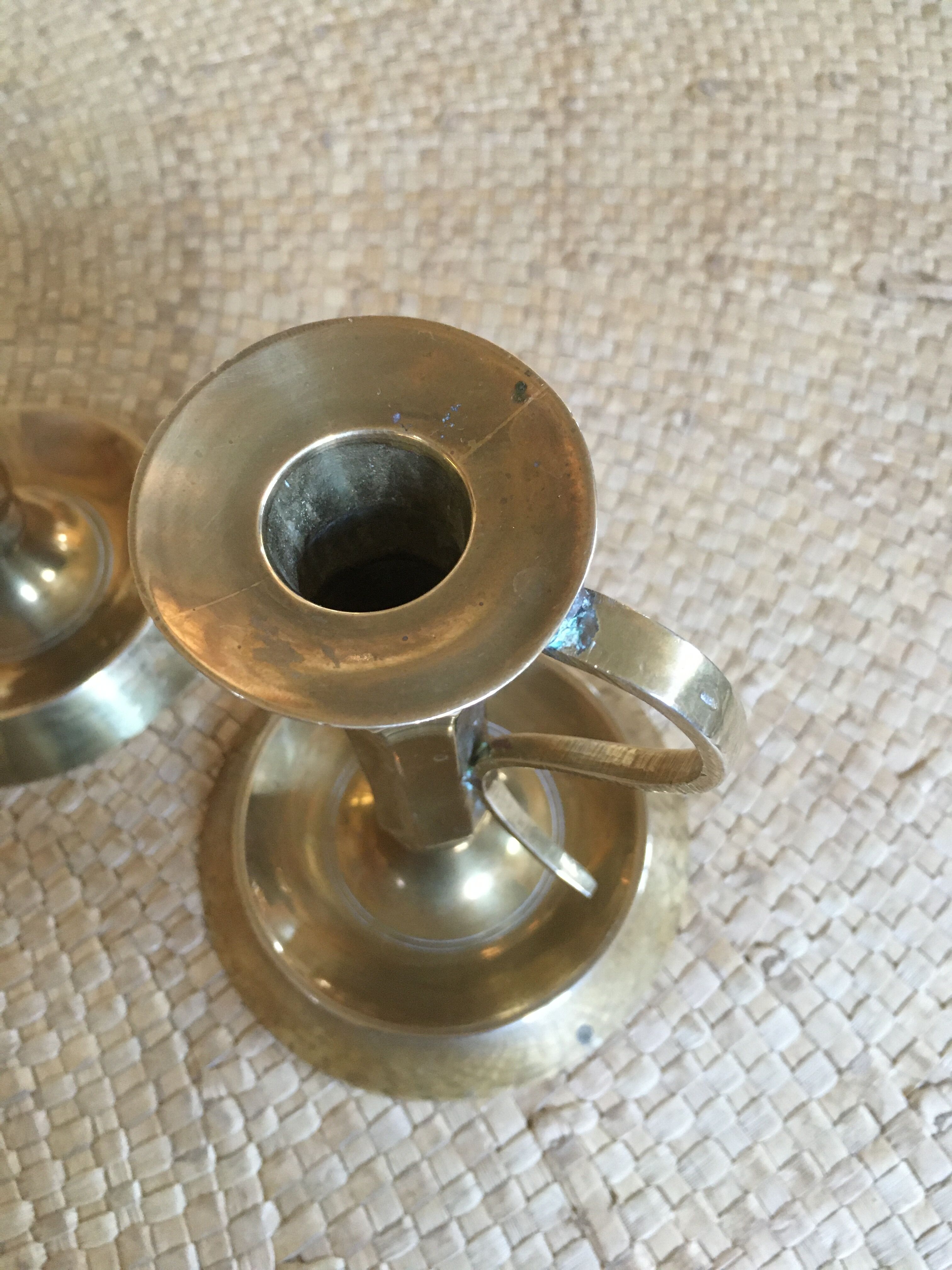 Duo of brass candlesticks