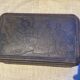 Cake tin from the early 20th century with embossed designs