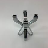 A chromed metal candle-holder "Chorus", design Karim Rashid, executed by Umbra / USA 2002