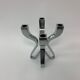 A chromed metal candle-holder "Chorus", design Karim Rashid, executed by Umbra / USA 2002