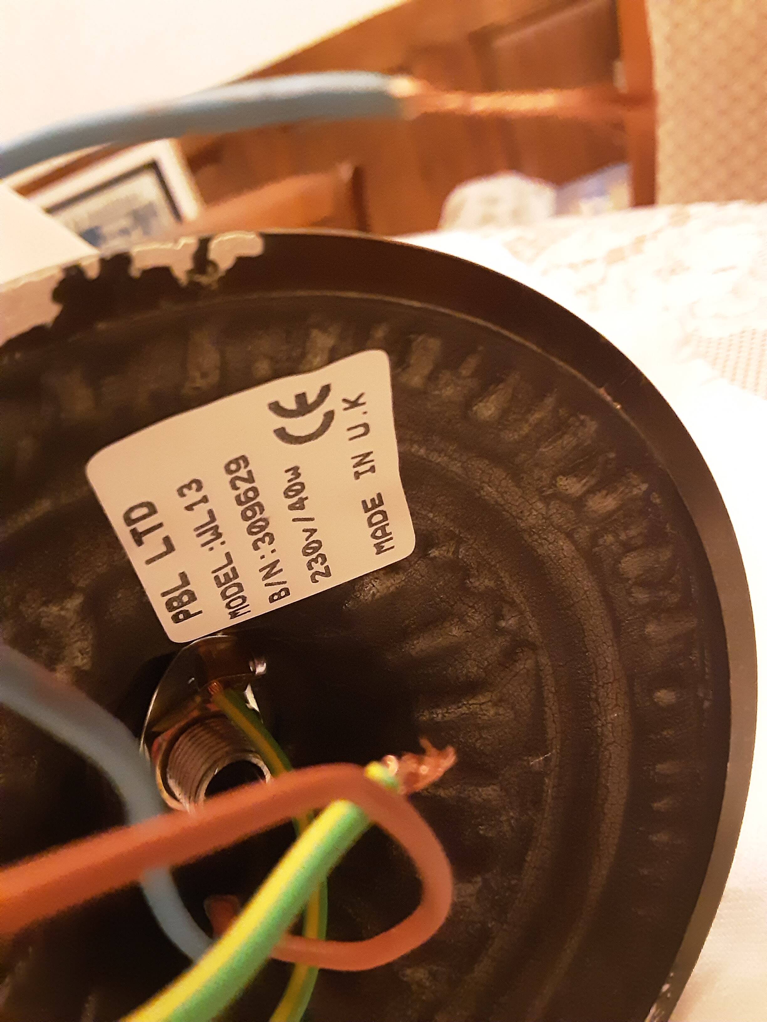 Glass wall light with iron frame