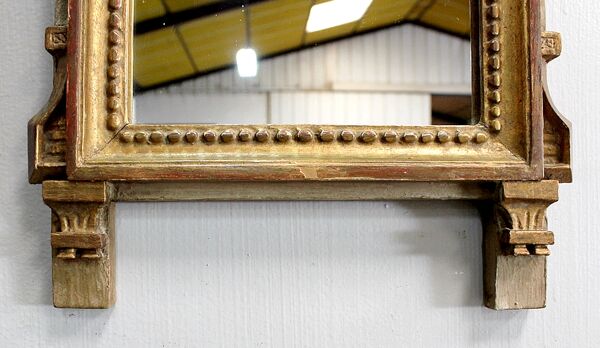 Miroir en bois doré, style Louis XVI – 1ère partie XXe - 60x30cm