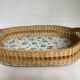 Old wicker basket tray with wooden beads.