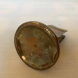Antique brass match holder with tulip base.