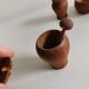 Small, beautiful lot consisting of a salt cellar, pepper shaker and honey jar.