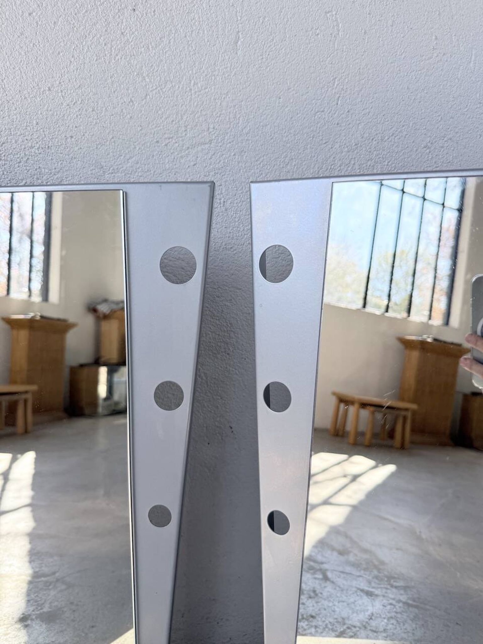 Pair of "Memphis" mirrors from the 80s in chrome and wood.