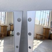 Pair of "Memphis" mirrors from the 80s in chrome and wood.