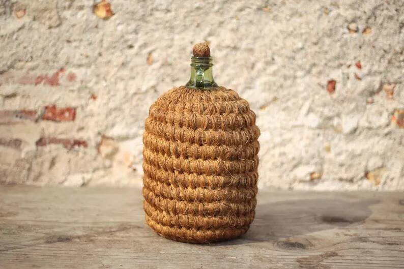 Lady Jeanne bottle, green glass bottle dressed in straw and wicker weaving, jar, vintage decor.