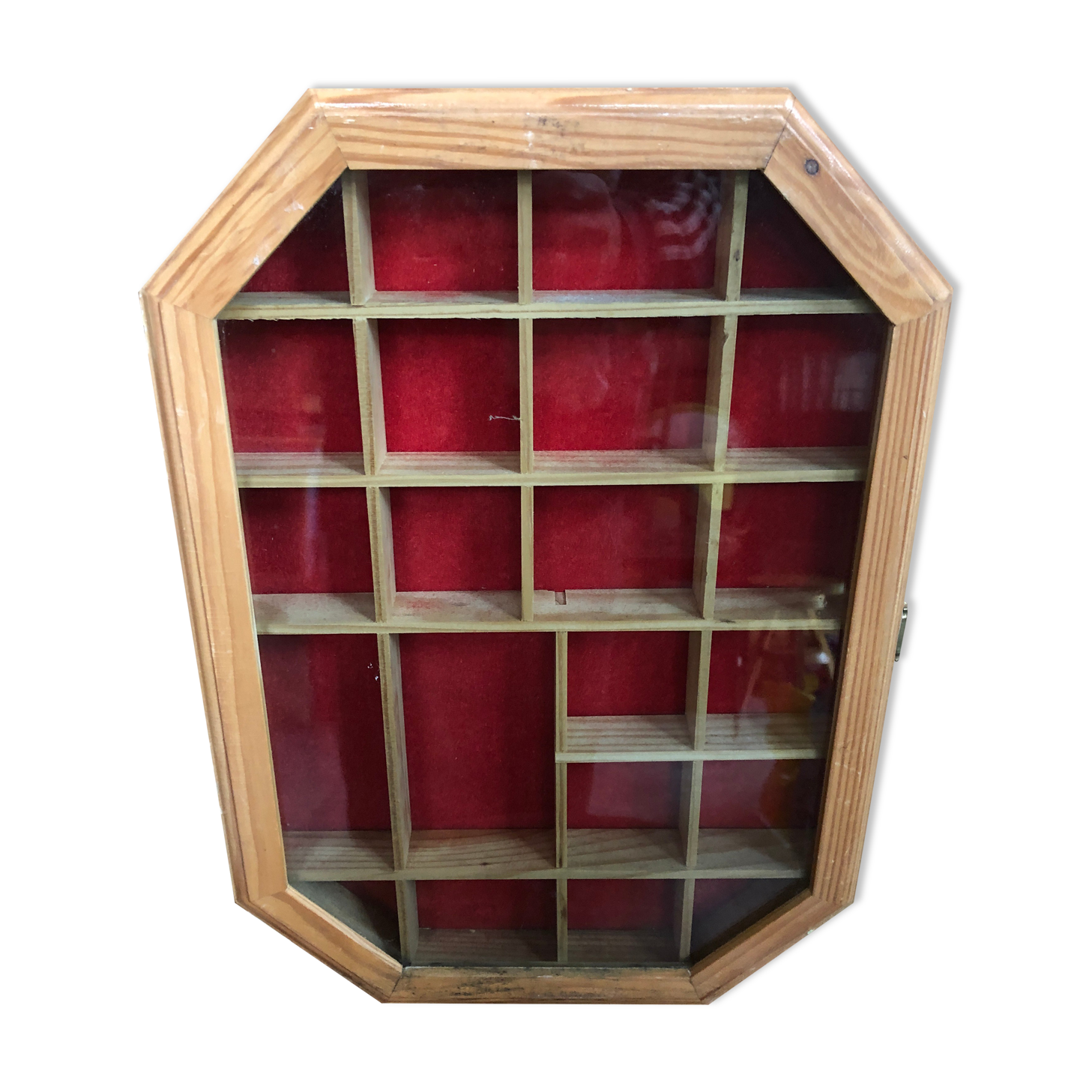 Old hanging showcase 22 wooden boxes red background