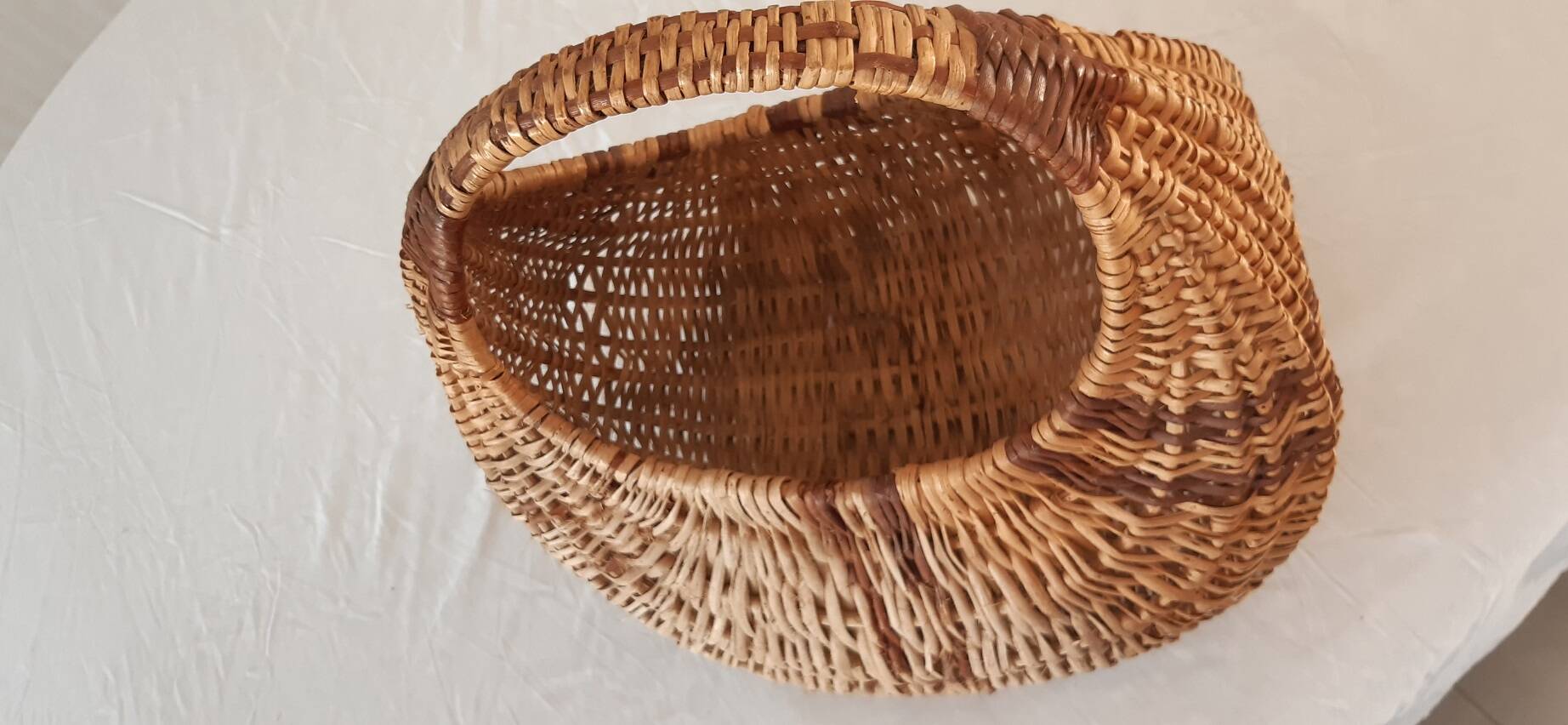 Old banana basket with wicker two colors