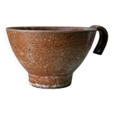 Tasse en grès moucheté
