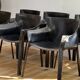 Set of 6 black leather armchairs from the 1970s